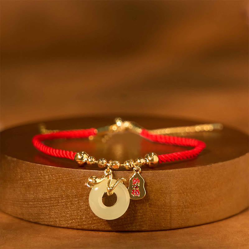 KarmaRipple's Bronze Plated Gold Jade Peace Buckle Fu Character Year Of The Snake Red String Fortune Bracelet p1