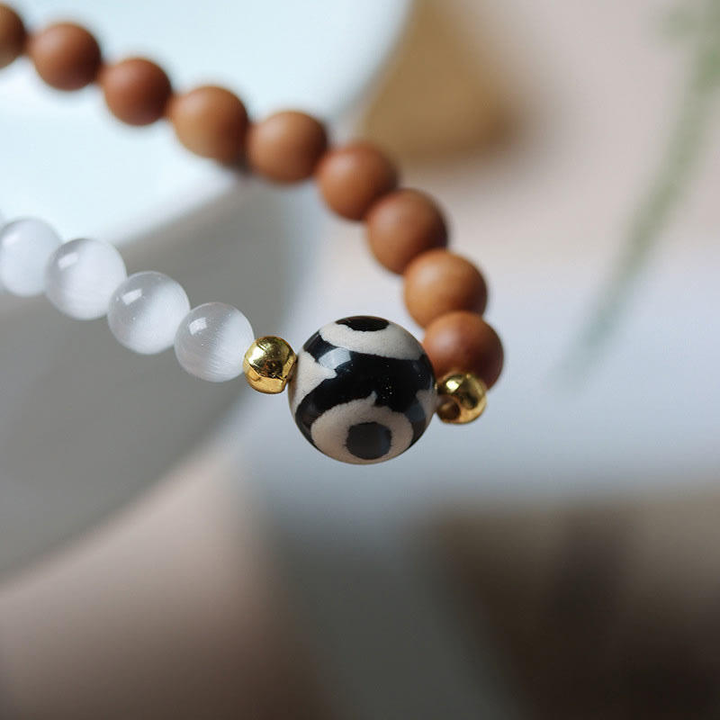 KarmaRipple's Sandalwood Cat's Eye Three-eyed Dzi Bead Gemstone Protectioin Bracelet p4