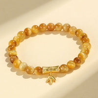 KarmaRipple's Tiger Eye Fu Character Bamboo Koi Fish Lotus Om Mani Padme Hum Protection Bracelet