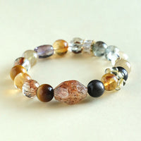 KarmaRipple's Super Seven Gemstone Topaz Obsidian Tiger Eye Positivity Bracelet