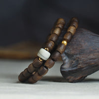 KarmaRipple's 999 Gold Rare Tarakan Agarwood Tibetan Old Spirit Bone Balance Strength Double Wrap Bracelet