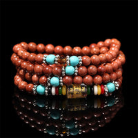 KarmaRipple's 108 Mala Beadwork Goldstone Om Mani Padme Hum Swastika Confidence Bracelet