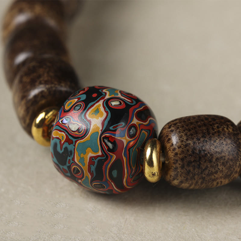 KarmaRipple's Agarwood Bronze Coin Auspicious Cloud Calm Bracelet p14